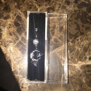 Navel/ belly button ring.